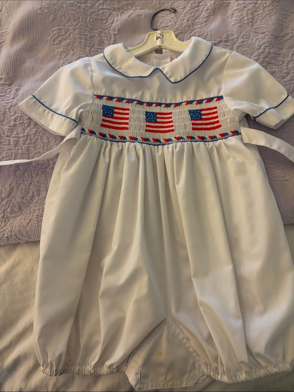 Classic White Smocked One-Piece with Flag Detail. 4th of July kid clothing!